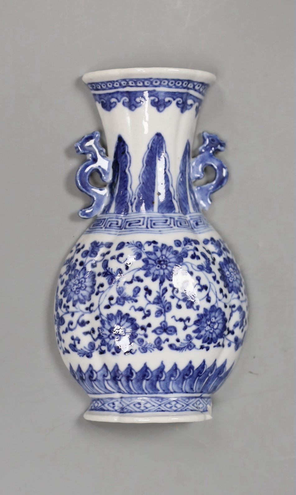 A Chinese blue and white wall vase shaped pocket, 19th century, 16.5cm tall